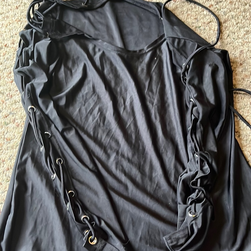My son calls it a “hooker dress” XL, black, one eye hole separating, no stains